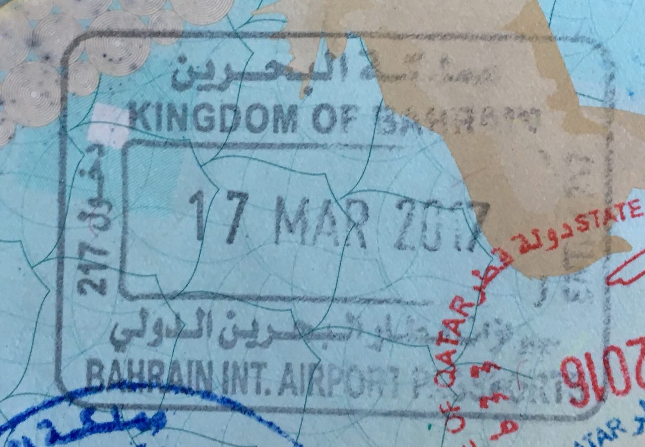 Bahrain passport entry stamp, representing LMRA visa and work permit services from GovtLink Solutions